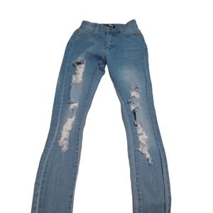 Fashion Nova, ripped size 0 jeans.